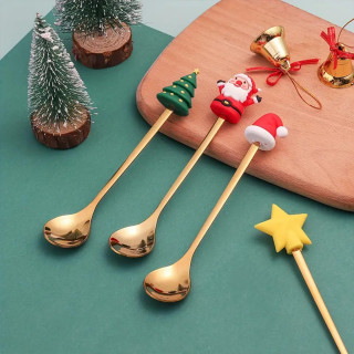 Zlatni novogodišnji set kašičica sa prazničnim motivima