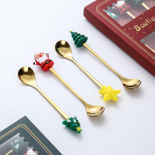 Zlatni novogodišnji set kašičica sa prazničnim motivima