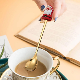 Zlatni novogodišnji set kašičica sa prazničnim motivima