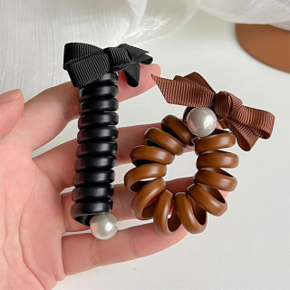 Japanska gumica za spiralnu pletenicu