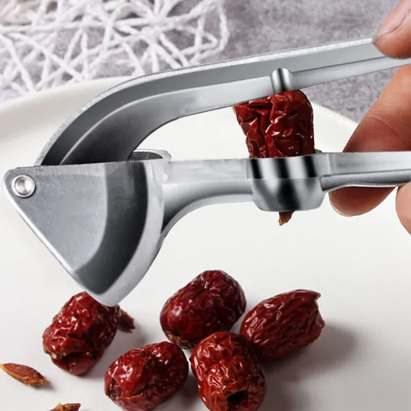 Garlic press - metalna presa za beli luk
