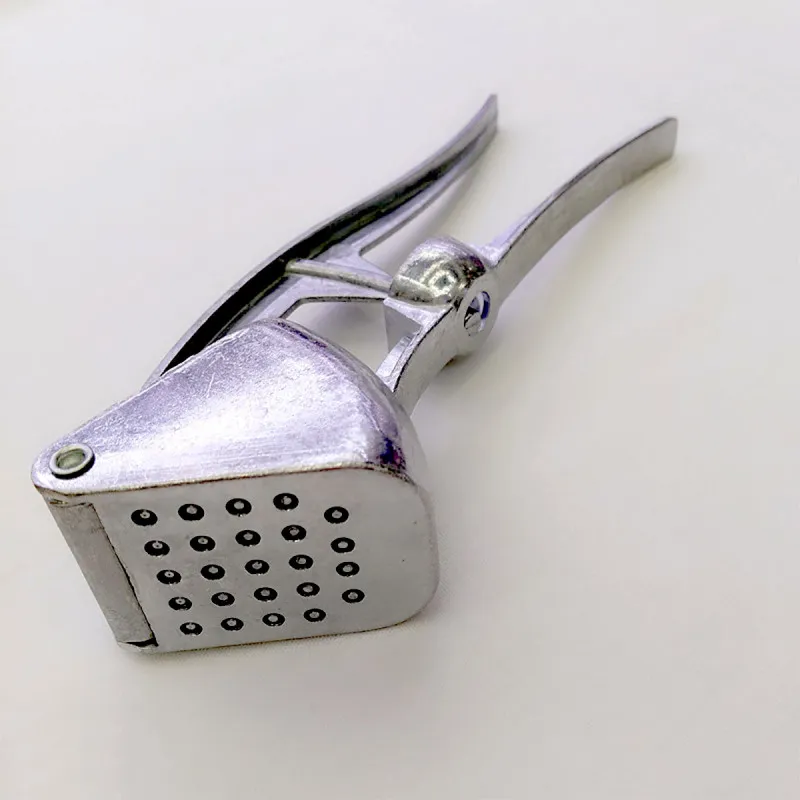Garlic press - metalna presa za beli luk