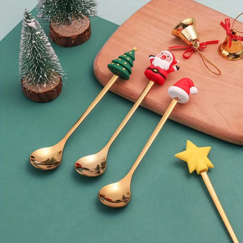 Zlatni novogodišnji set kašičica sa prazničnim motivima