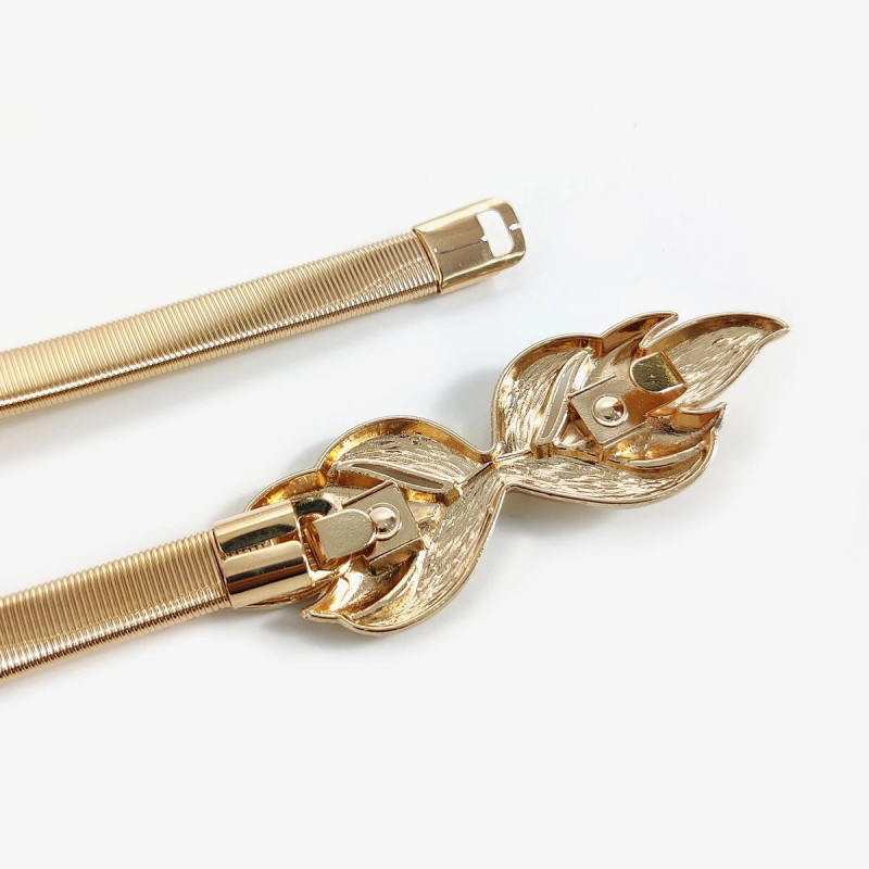 Zlatni elastični kaiš sa dekorativnom kopčom u obliku lista