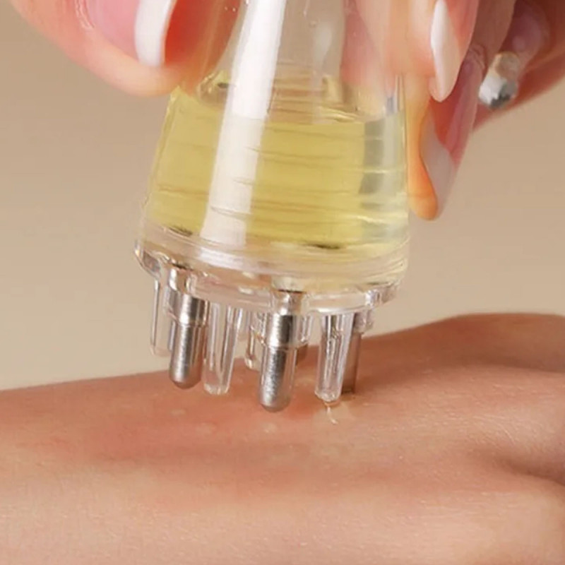 Masažni aplikator losiona i seruma protiv opadanja kose