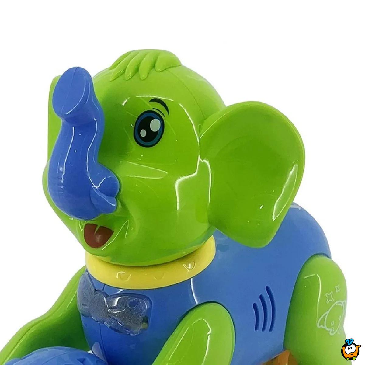 Muzička i svetlosna igračka - šareno slonče